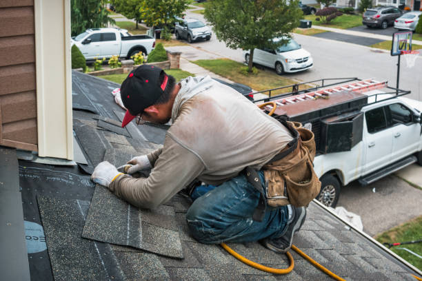 Professional Gutter Repair And Installation technician working in Anderson, IN